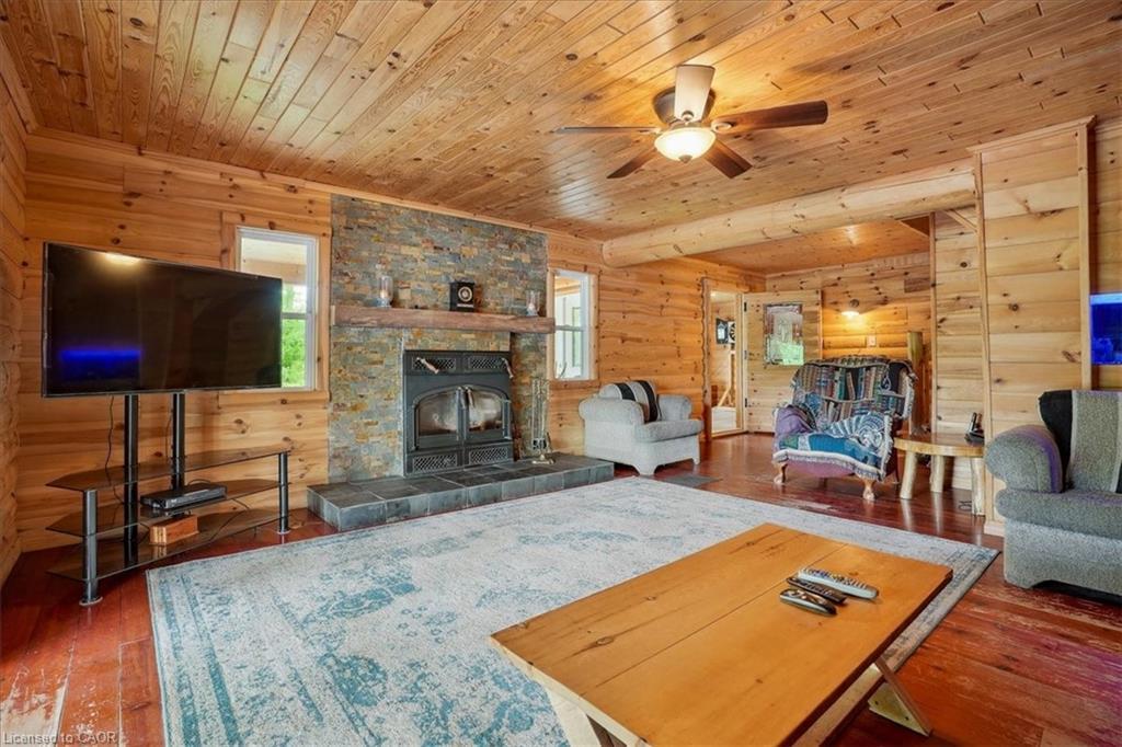 96 Charlotteville 2 Road, St. Williams, ON - Indoor Photo Showing Living Room With Fireplace