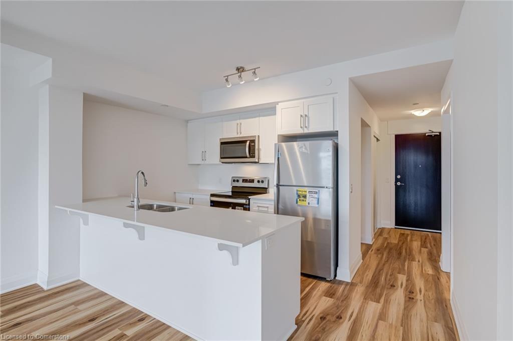 221-1936 Rymal Road E, Hamilton, ON - Indoor Photo Showing Kitchen With Stainless Steel Kitchen With Double Sink