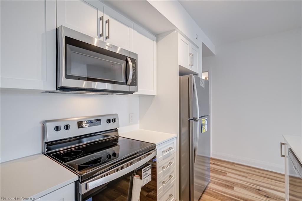 221-1936 Rymal Road E, Hamilton, ON - Indoor Photo Showing Kitchen With Stainless Steel Kitchen