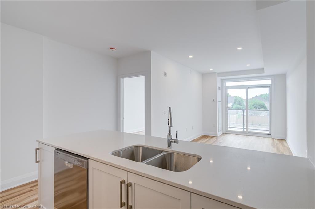 221-1936 Rymal Road E, Hamilton, ON - Indoor Photo Showing Kitchen With Double Sink
