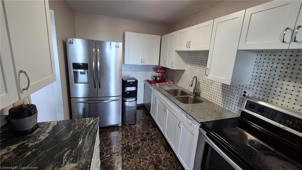706-279 Chandler Drive, Kitchener, ON - Indoor Photo Showing Kitchen With Double Sink