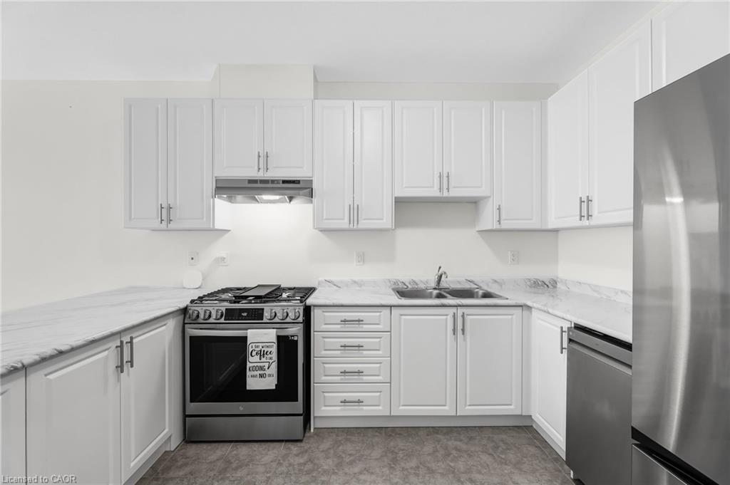 11 Harwood Street, Tillsonburg, ON - Indoor Photo Showing Kitchen With Double Sink