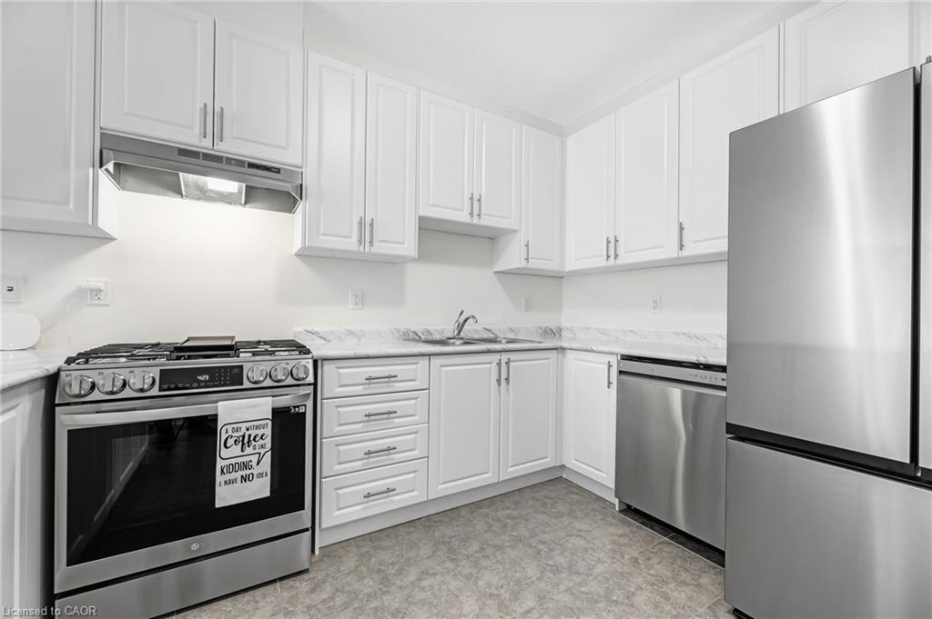 11 Harwood Street, Tillsonburg, ON - Indoor Photo Showing Kitchen With Double Sink