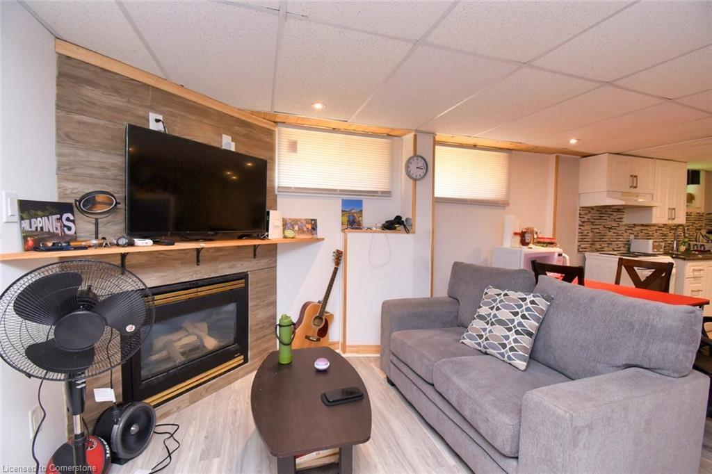 205 Ivon Avenue, Hamilton, ON - Indoor Photo Showing Living Room With Fireplace