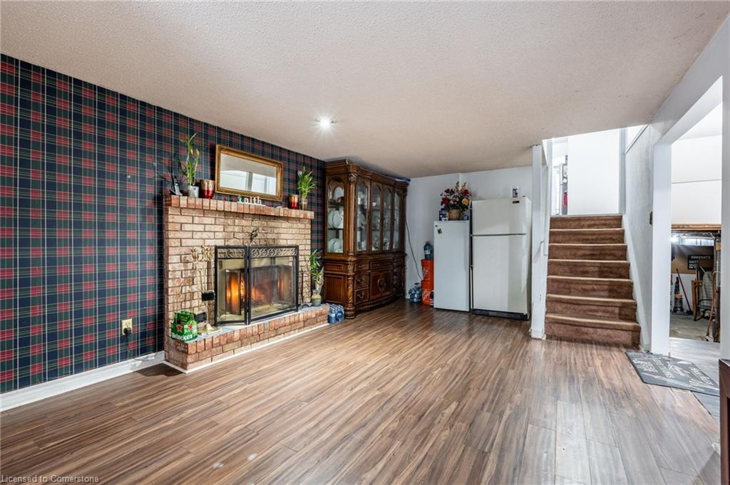 97 Guildwood Drive, Hamilton, ON - Indoor Photo Showing Living Room With Fireplace