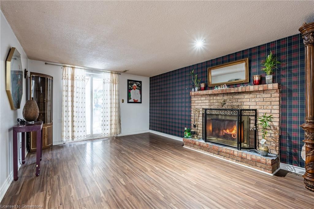 97 Guildwood Drive, Hamilton, ON - Indoor Photo Showing Living Room With Fireplace