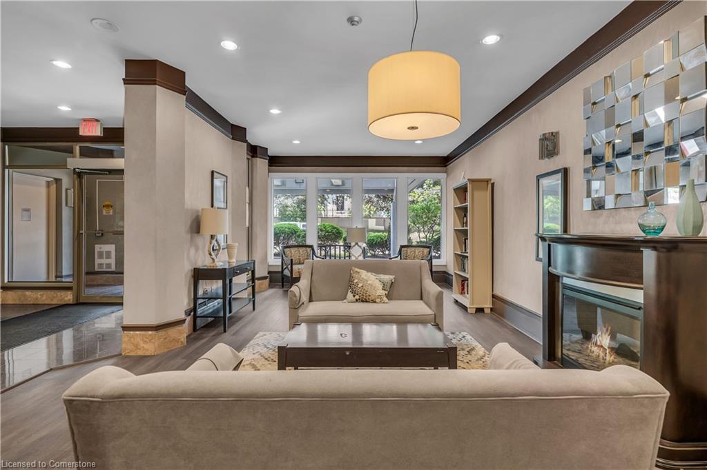 203-67 Caroline Street S, Hamilton, ON - Indoor Photo Showing Other Room With Fireplace