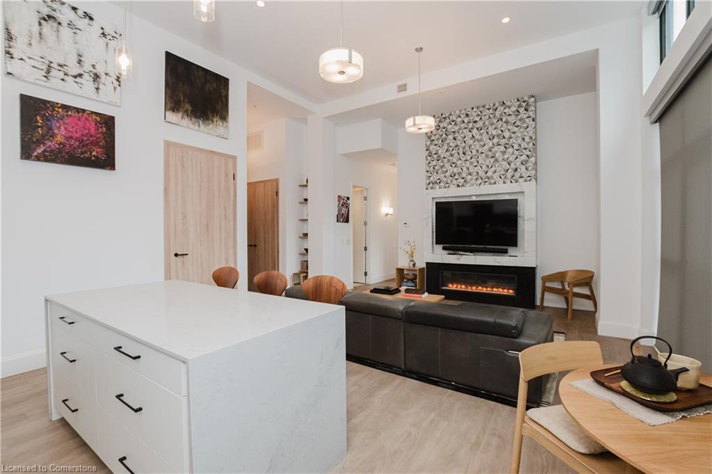 Lph13-118 King Street E, Hamilton, ON - Indoor Photo Showing Living Room With Fireplace