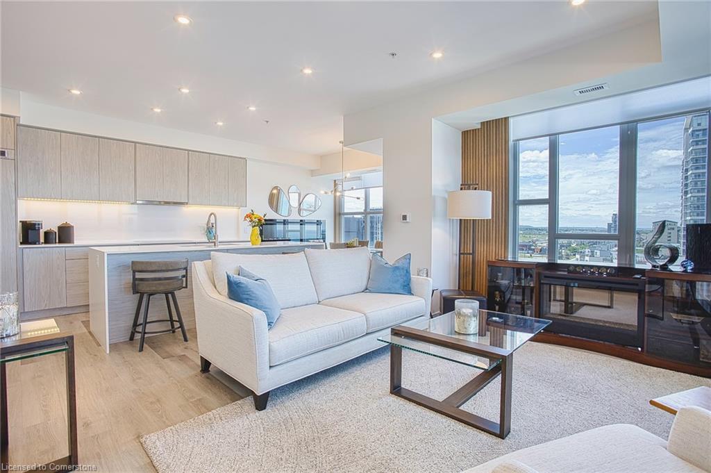 707-16 Concord Place, Grimsby, ON - Indoor Photo Showing Living Room