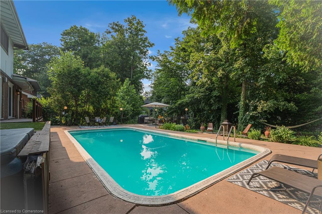 316 Fennell Avenue W, Hamilton, ON - Outdoor With In Ground Pool With Deck Patio Veranda With Backyard