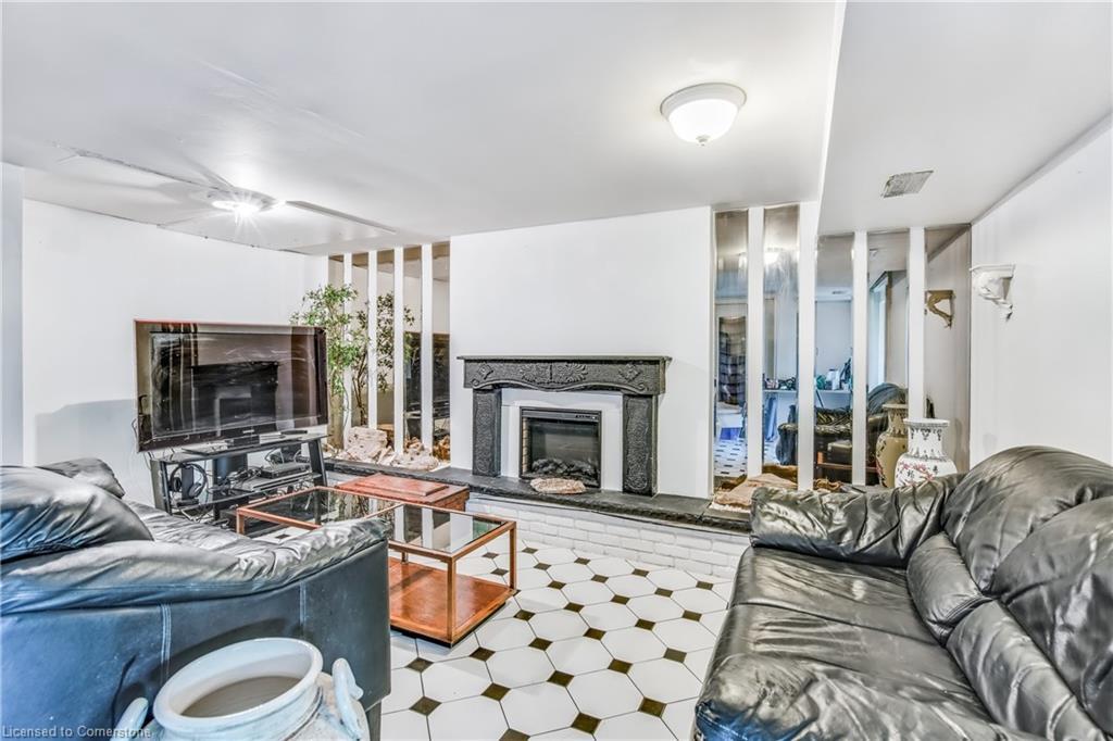 348 Barrick Road, Port Colborne, ON - Indoor Photo Showing Living Room With Fireplace
