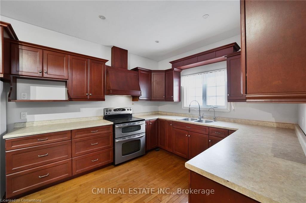 1632 Conc 2-3 Road, Cochrane, ON - Indoor Photo Showing Kitchen With Double Sink