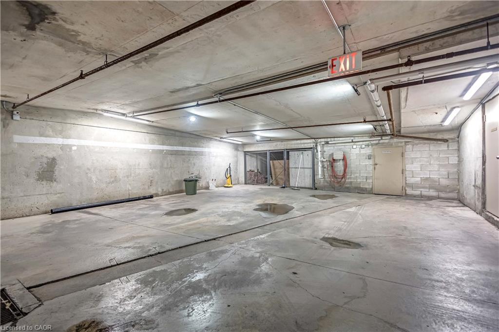 704-1800 The Collegeway, Mississauga, ON - Indoor Photo Showing Garage