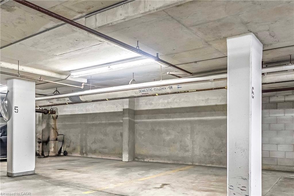 704-1800 The Collegeway, Mississauga, ON - Indoor Photo Showing Garage