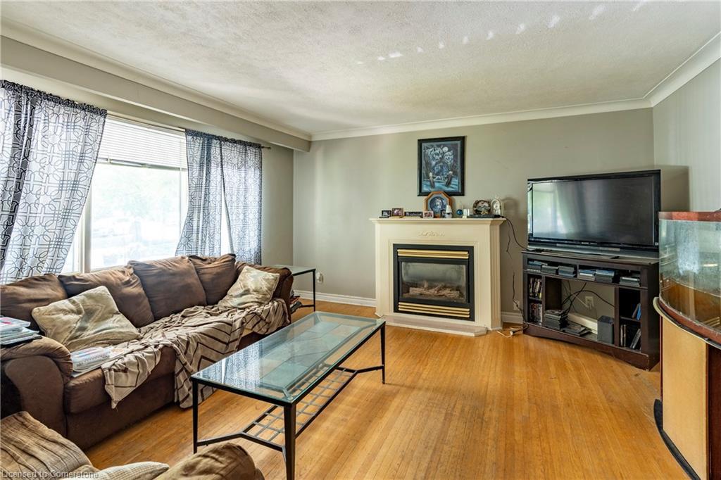 104 Boniface Avenue, Kitchener, ON - Indoor Photo Showing Living Room With Fireplace