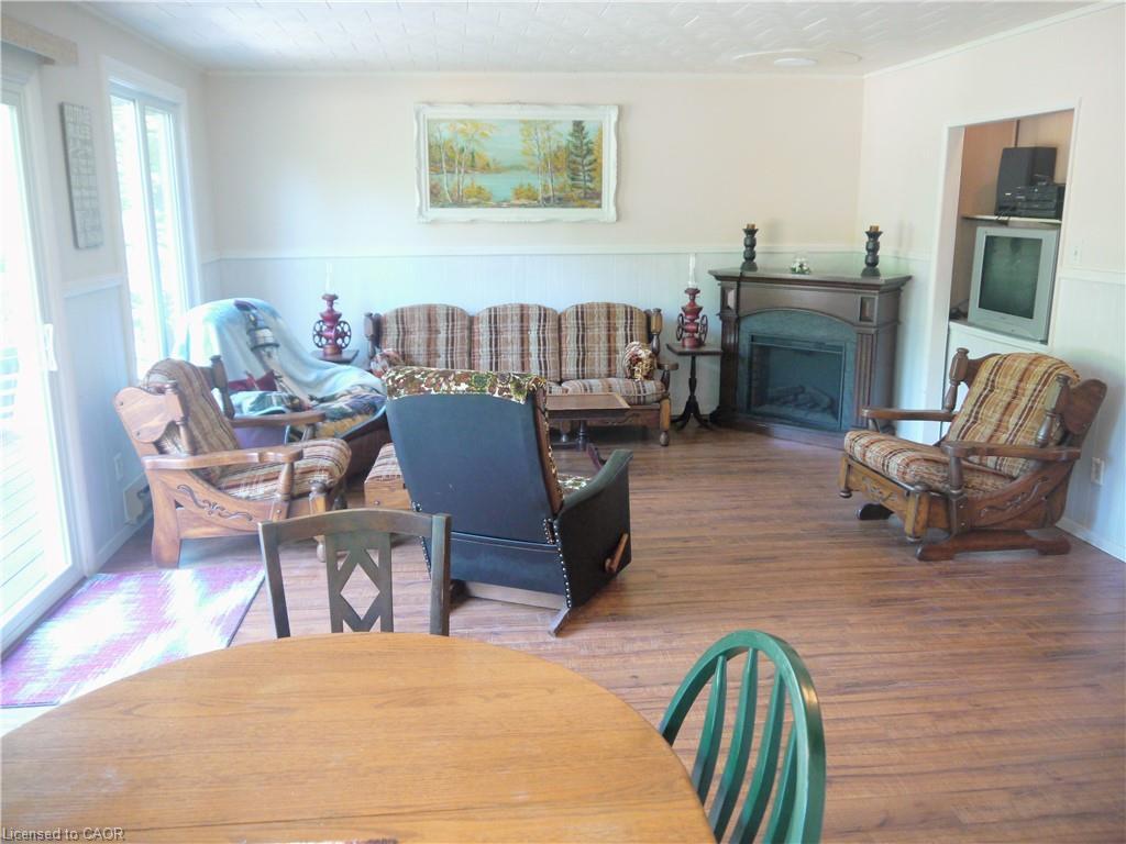 313 Spruce Crescent, Ripley, ON - Indoor Photo Showing Living Room With Fireplace