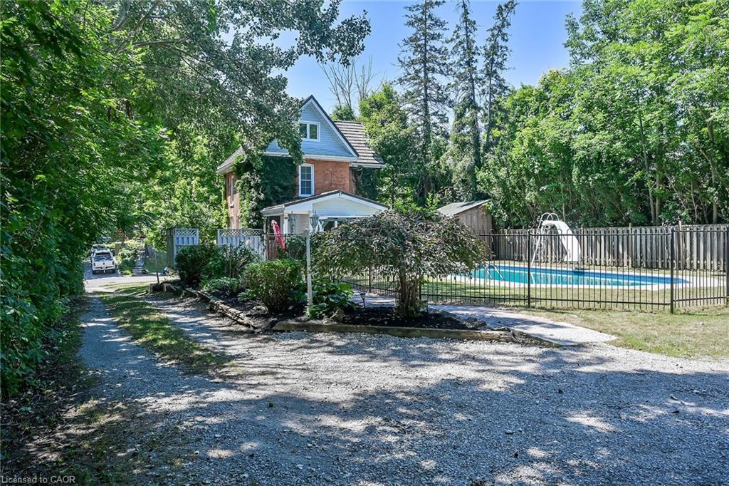 94 Sutherland Street W, Caledonia, ON - Outdoor With In Ground Pool