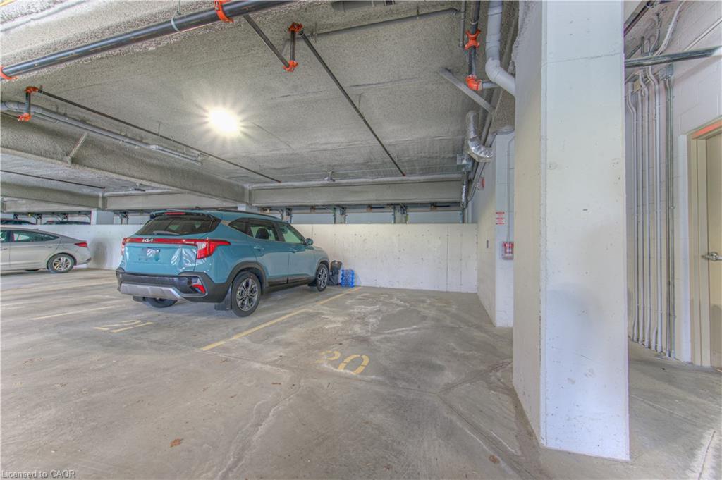 407-155 Water Street S, Cambridge, ON - Indoor Photo Showing Garage