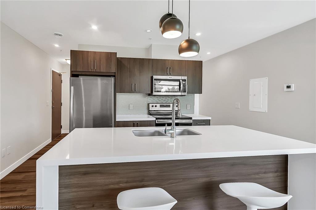 307-455 Charlton Avenue E, Hamilton, ON - Indoor Photo Showing Kitchen With Stainless Steel Kitchen With Double Sink With Upgraded Kitchen