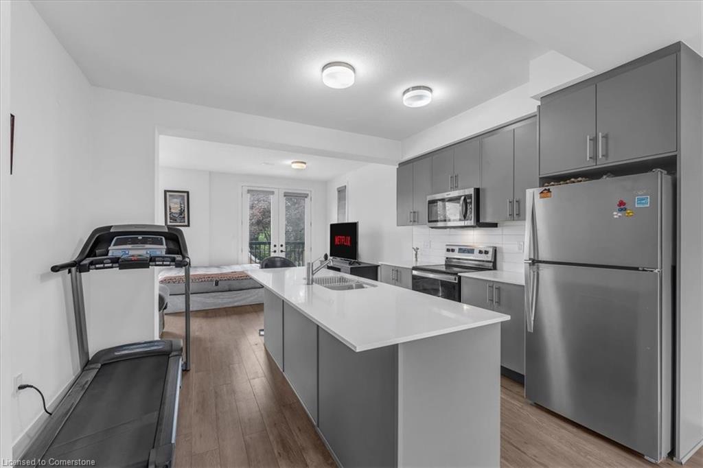 10-99 Roger Street, Waterloo, ON - Indoor Photo Showing Kitchen With Double Sink