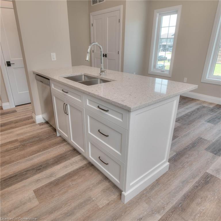 10-33 Murray Court, Milverton, ON - Indoor Photo Showing Kitchen With Double Sink
