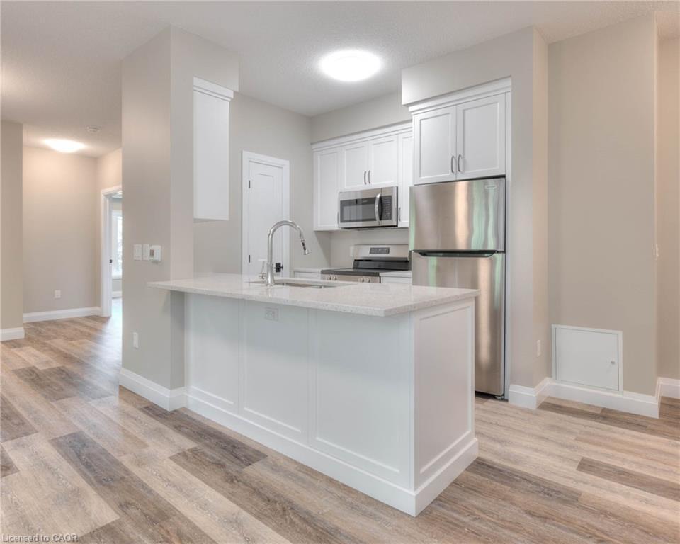11-33 Murray Court, Milverton, ON - Indoor Photo Showing Kitchen With Upgraded Kitchen