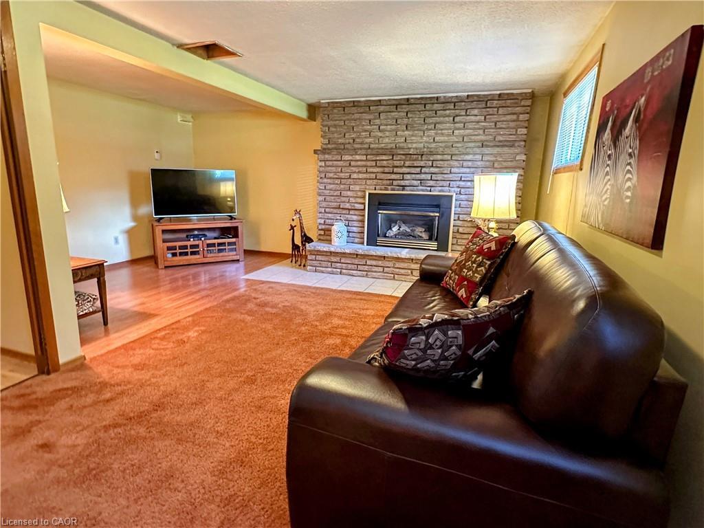 804 Ruby Street, Port Elgin, ON - Indoor Photo Showing Living Room With Fireplace
