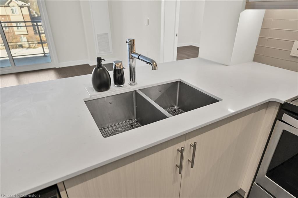 312-320 Plains Road E, Burlington, ON - Indoor Photo Showing Kitchen With Double Sink