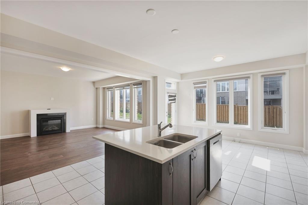 101 York Drive, Peterborough, ON - Indoor Photo Showing Kitchen With Fireplace With Double Sink