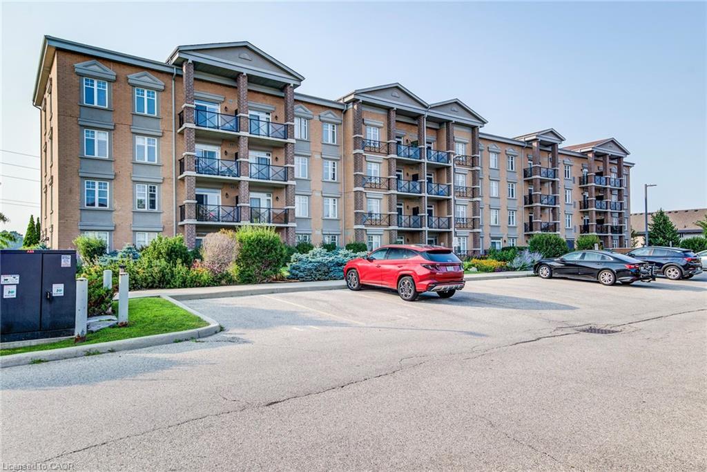 401-2 Colonial Drive, Guelph, ON - Outdoor With Balcony With Facade