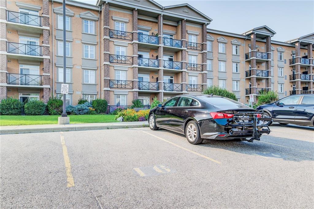 401-2 Colonial Drive, Guelph, ON - Outdoor With Balcony With Facade