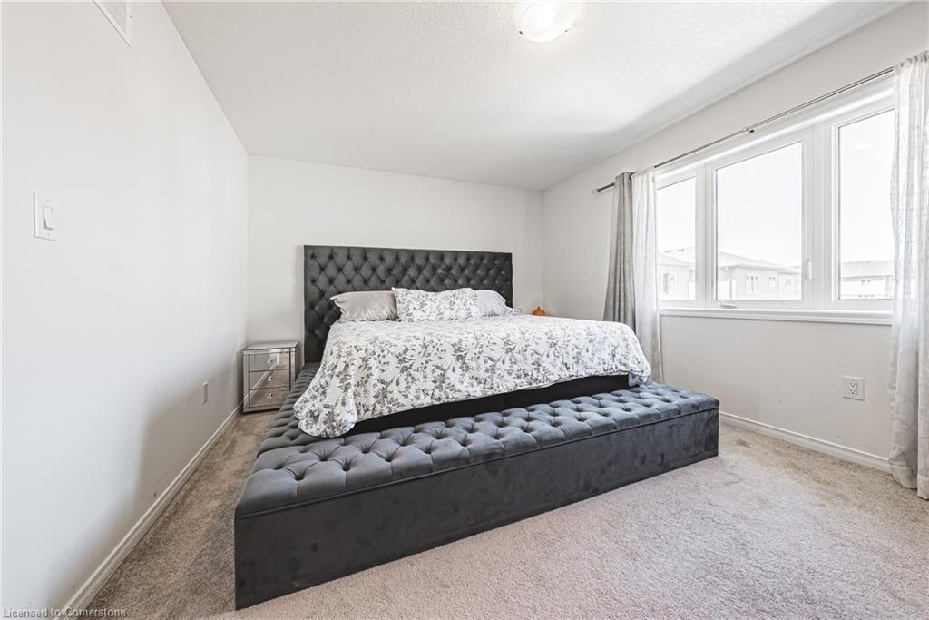11 Mcwatters Street, Binbrook, ON - Indoor Photo Showing Bedroom