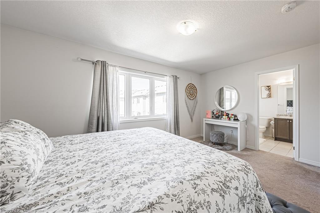 11 Mcwatters Street, Binbrook, ON - Indoor Photo Showing Bedroom