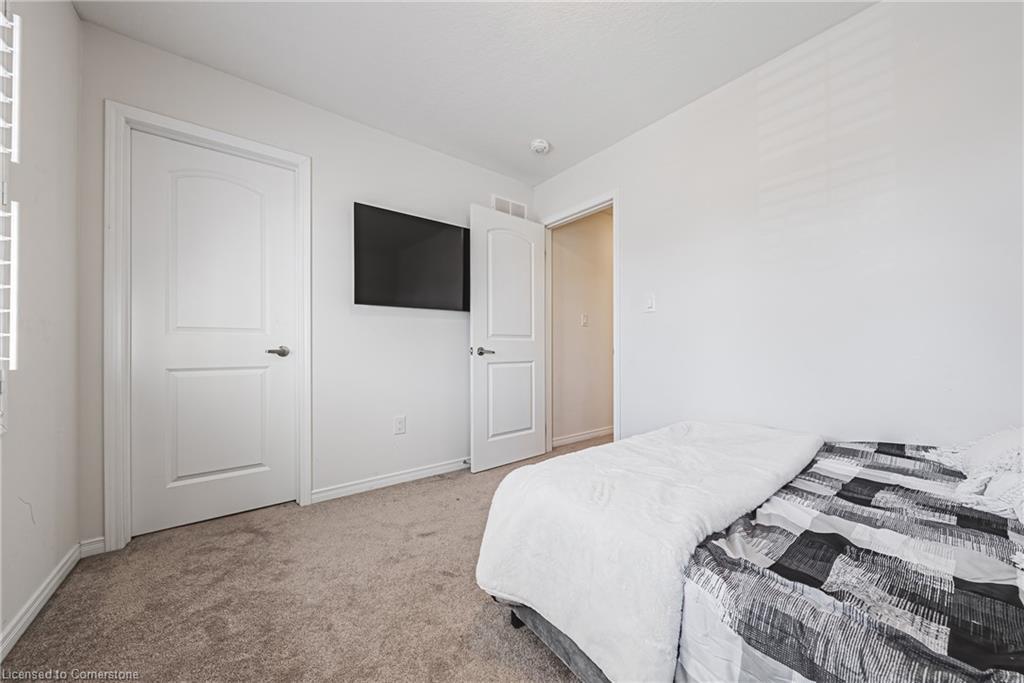 11 Mcwatters Street, Binbrook, ON - Indoor Photo Showing Bedroom