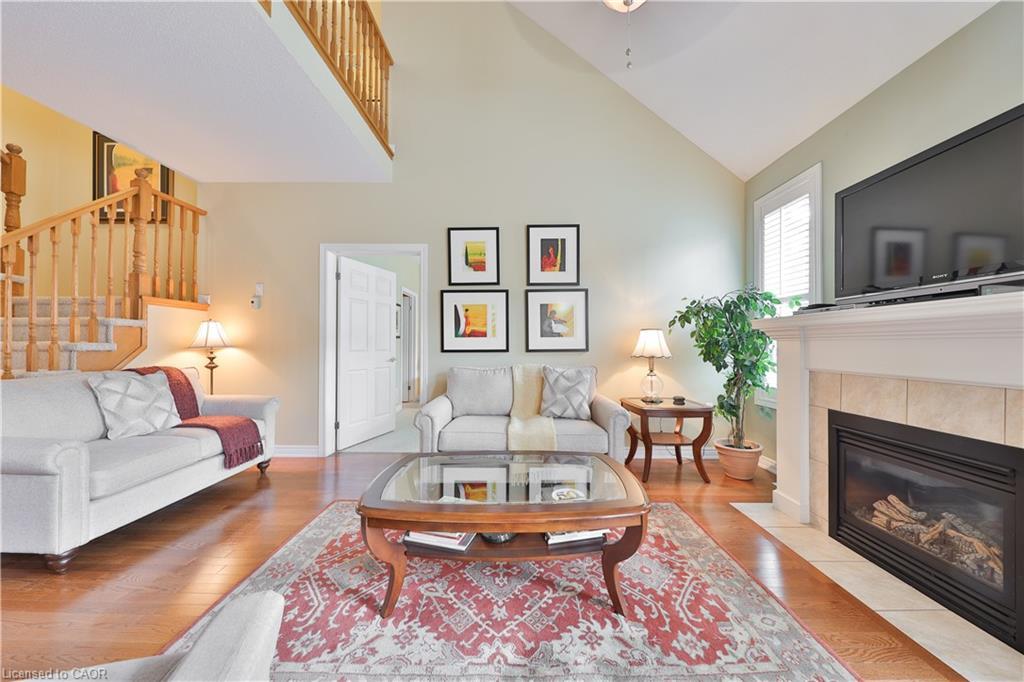127-2125 Itabashi Way, Burlington, ON - Indoor Photo Showing Living Room With Fireplace