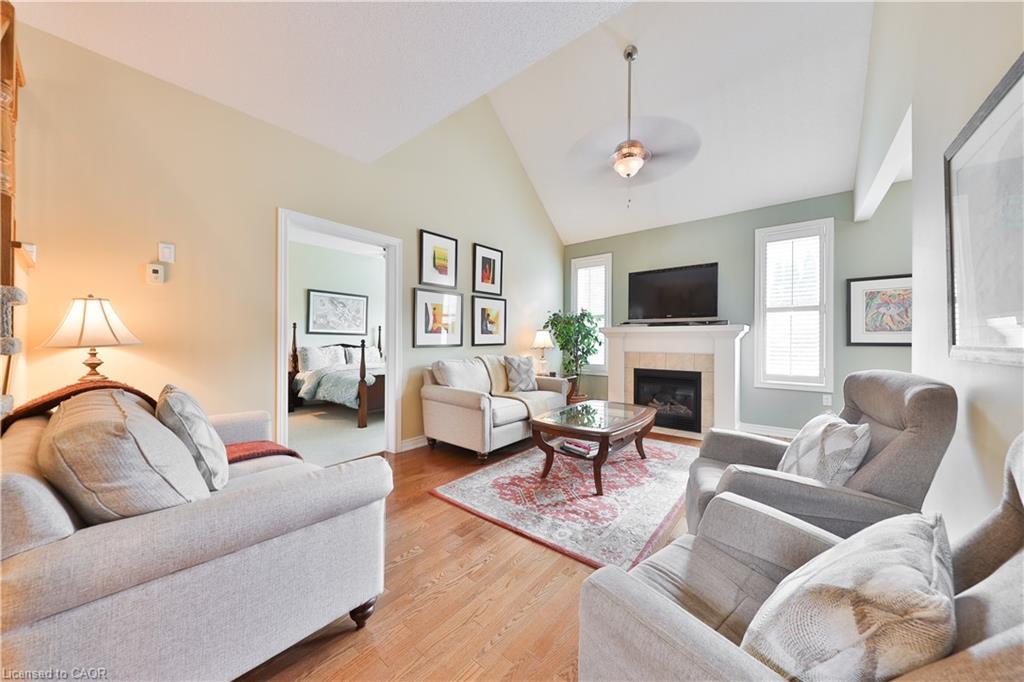 127-2125 Itabashi Way, Burlington, ON - Indoor Photo Showing Living Room With Fireplace