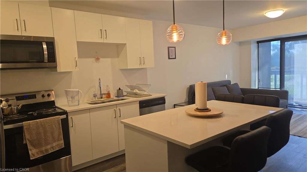 102-332 Gosling Gardens, Guelph, ON - Indoor Photo Showing Kitchen With Double Sink