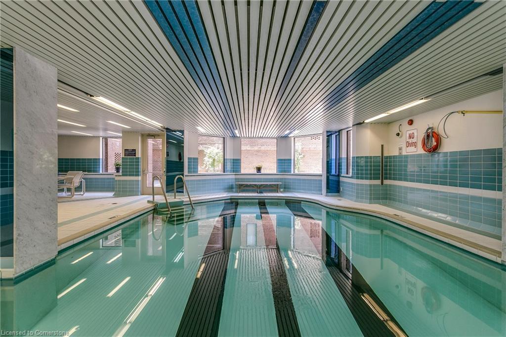 710-100 Lakeshore Road E, Oakville, ON - Indoor Photo Showing Other Room With In Ground Pool