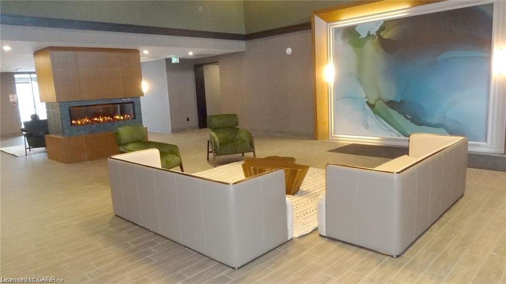 1005-450 Dundas Street E, Waterdown, ON - Indoor With Fireplace