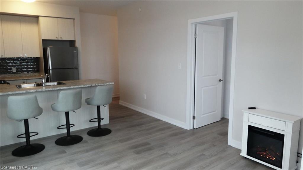 1005-450 Dundas Street E, Waterdown, ON - Indoor Photo Showing Kitchen With Double Sink