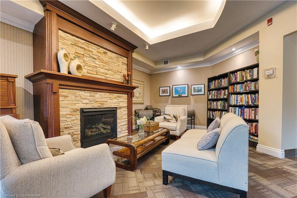 103-400 Romeo Street N, Stratford, ON - Indoor Photo Showing Living Room With Fireplace