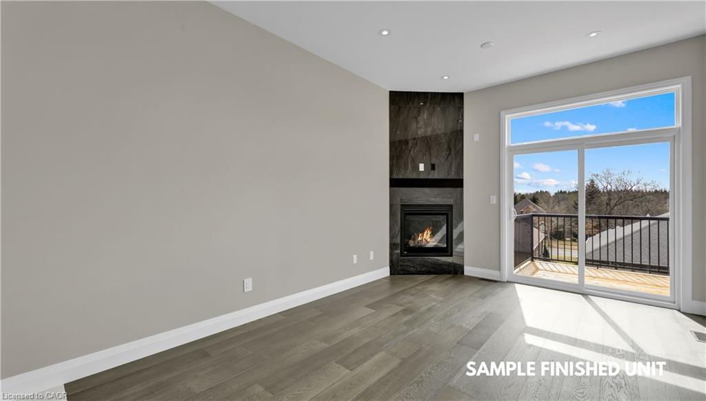 924 Garden Court Crescent, Woodstock, ON - Indoor With Fireplace