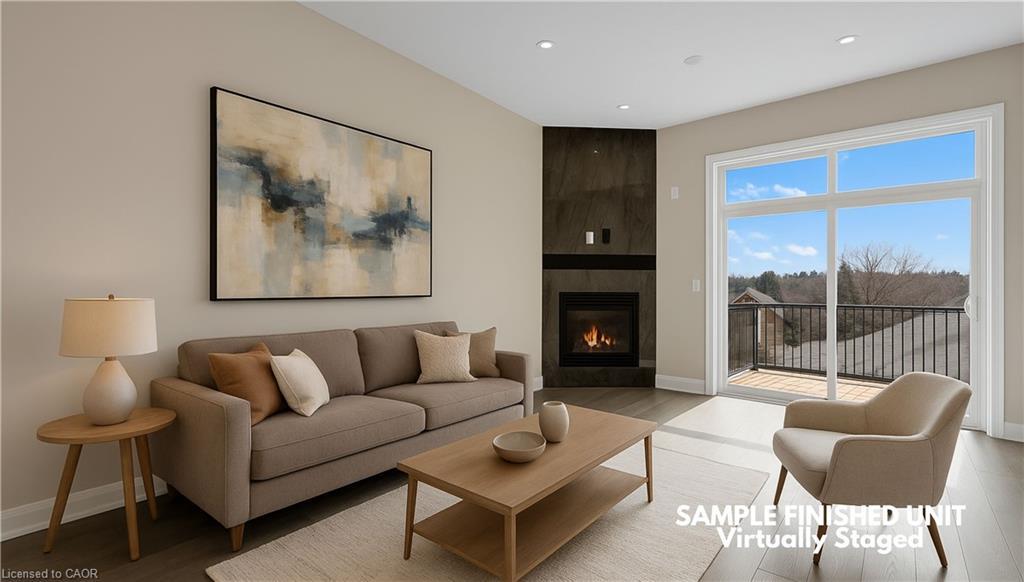 924 Garden Court Crescent, Woodstock, ON - Indoor Photo Showing Living Room With Fireplace