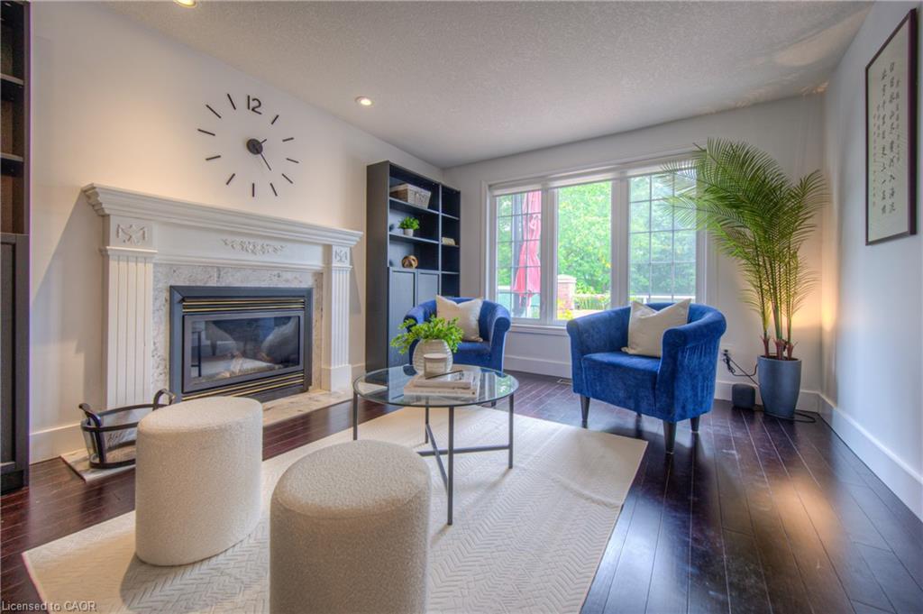 4-313 George Street N, Cambridge, ON - Indoor Photo Showing Living Room With Fireplace