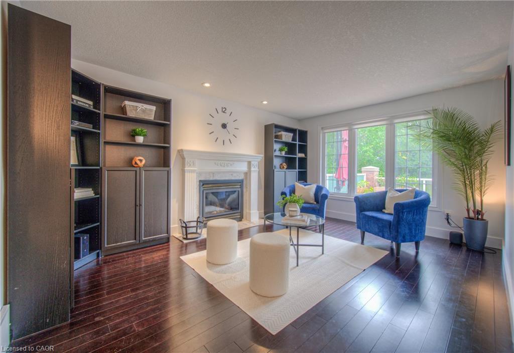 4-313 George Street N, Cambridge, ON - Indoor Photo Showing Living Room With Fireplace
