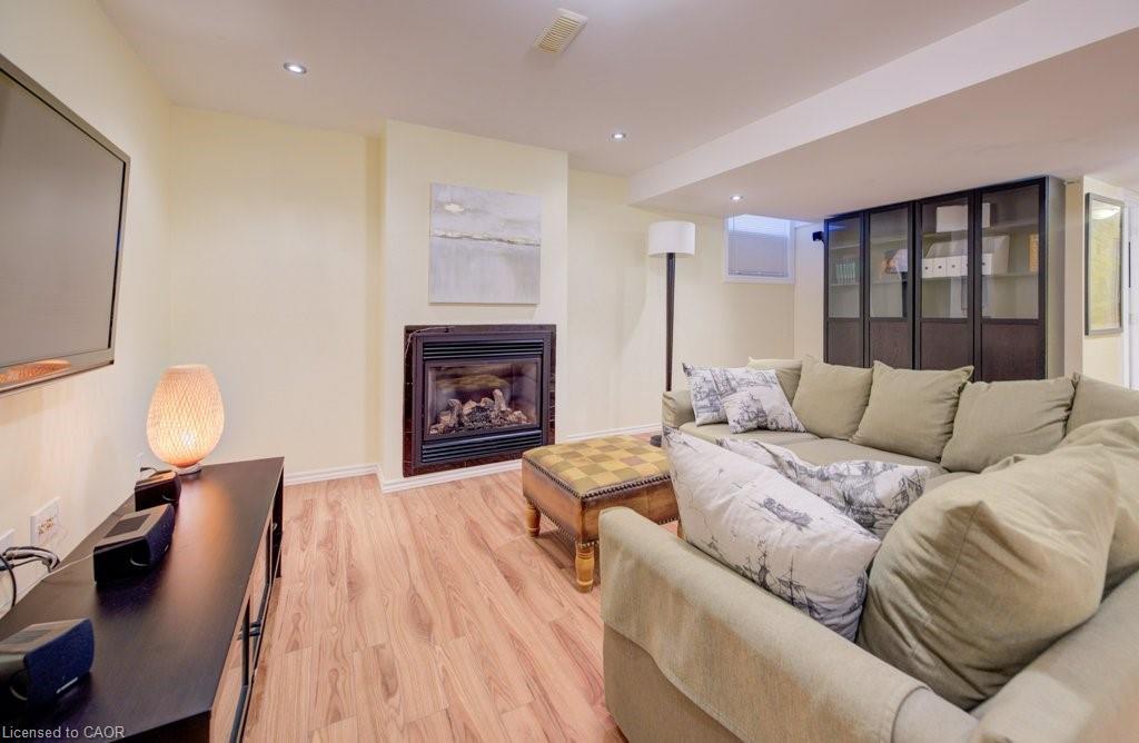 704 Shediac Crescent, Waterloo, ON - Indoor Photo Showing Living Room With Fireplace