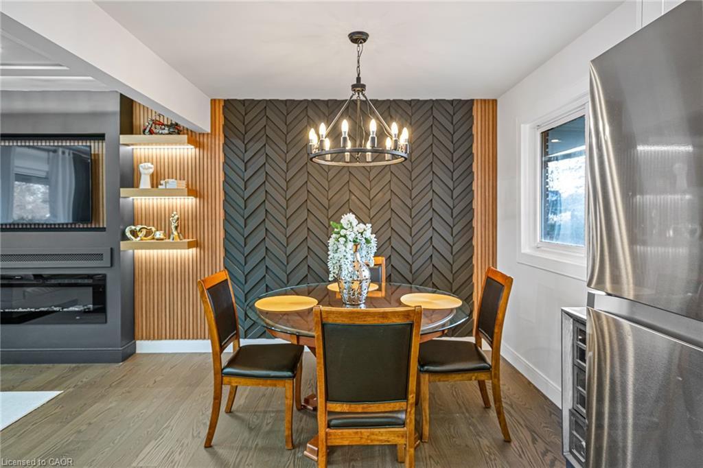 15 Andres Street, Virgil, ON - Indoor Photo Showing Dining Room With Fireplace