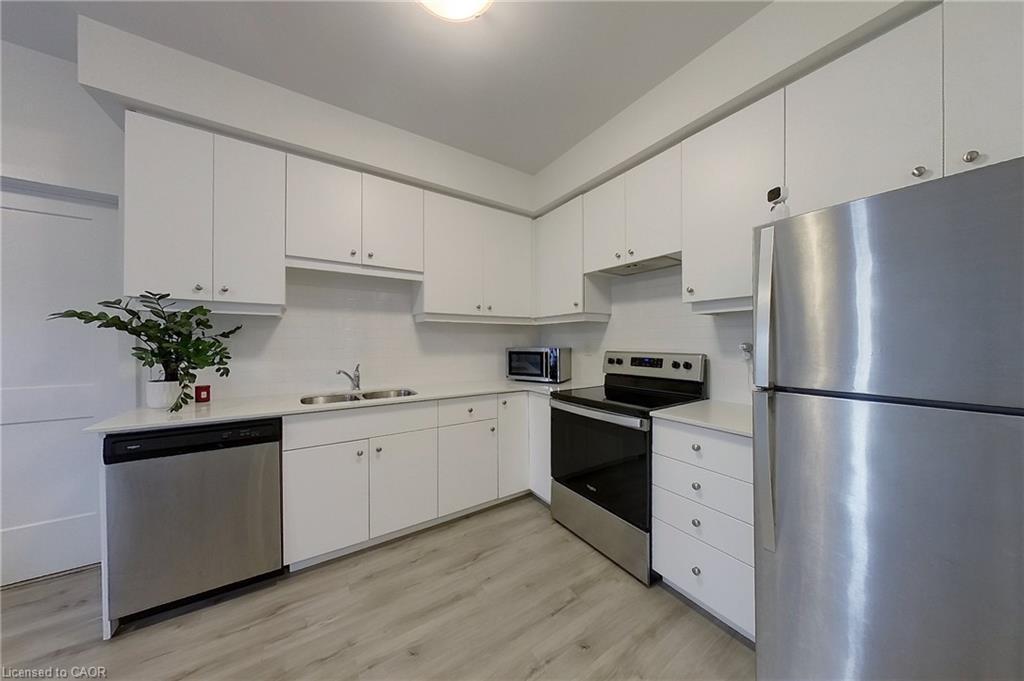 403-251 Northfield Drive E, Waterloo, ON - Indoor Photo Showing Kitchen With Double Sink