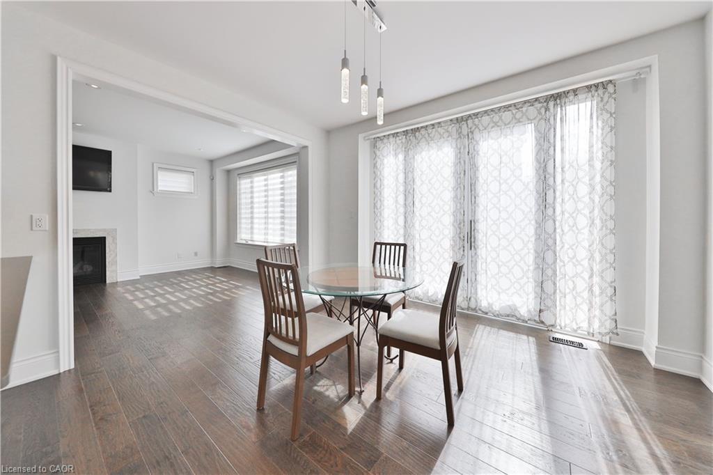 2163 Vineland Crescent, Oakville, ON - Indoor Photo Showing Dining Room With Fireplace