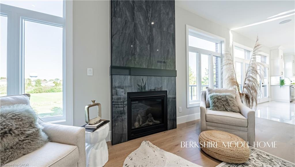 419 Masters Drive, Woodstock, ON - Indoor Photo Showing Living Room With Fireplace